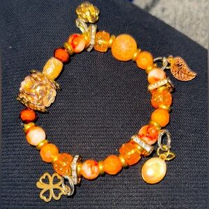 Orange flower charm bracelet